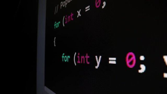 Closeup macro shot movement of coding script moving across LED screen with real-time AI-generated typing, showcasing advanced AI learning in optimization, debug and coding for software development.