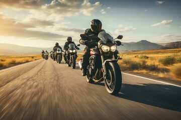 A gathering of motorcyclists riding together. A group of bikers ride fast motorcycles on an empty road against a beautiful cloudy sky. Sport bikes are fast, and fun to ride. - obrazy, fototapety, plakaty