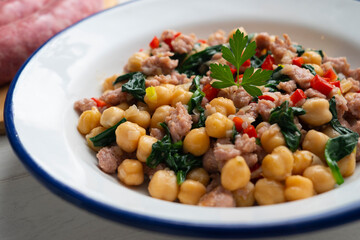 Chickpea salad with spinach, minced pork and red pepper.