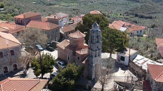 Aerial view over old stoned traditional church in Vorio village located near Kentro Avia and Pigadia Villages in Mani area, Messenia, GreeceMessenia, Greece