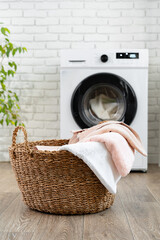 Modern white washing machine close up photo