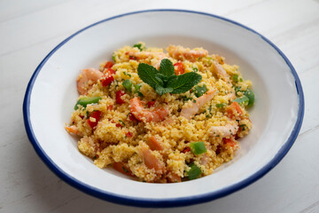 Couscous salad with vegetables and prawns