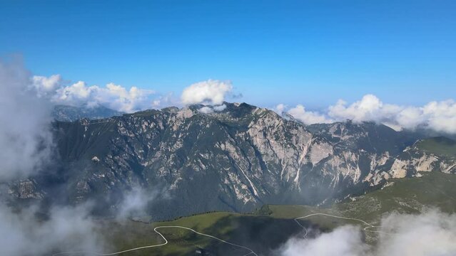 Flying through the clouds and over mountains