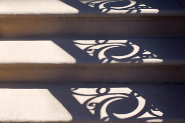 steps with shadow pattern of scroll designs in art nouveau historic style