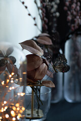 Dry brown and gry leafs with butterflies interior decor.