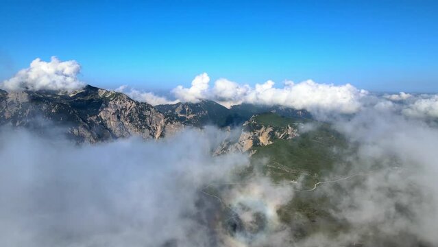 Flying through the clouds and over mountains