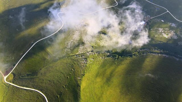 Flying through the clouds and over mountains