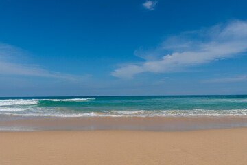Fototapeta na wymiar Nature view of beautiful tropical beach and sea in sunny day. Beach sea space aera