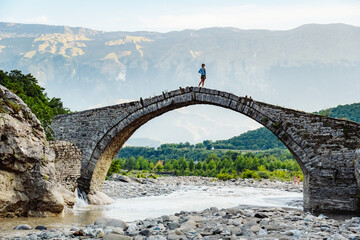 Stream of hot sulfuric water in the thermal baths of Permet Albania. Langarica Canyon, Kadiut Bridge - obrazy, fototapety, plakaty
