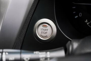 Close up engine car start button. Start stop engine modern new car button,Makes it easy to turn...