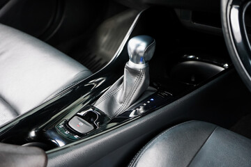 automatic transmission shift selector in the car interior. Closeup a manual shift of modern car...