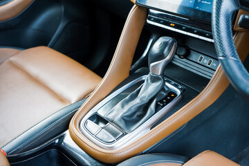 automatic transmission shift selector in the car interior. Closeup a manual shift of modern car...