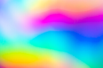 Abstract blur holographic rainbow foil iridescent background