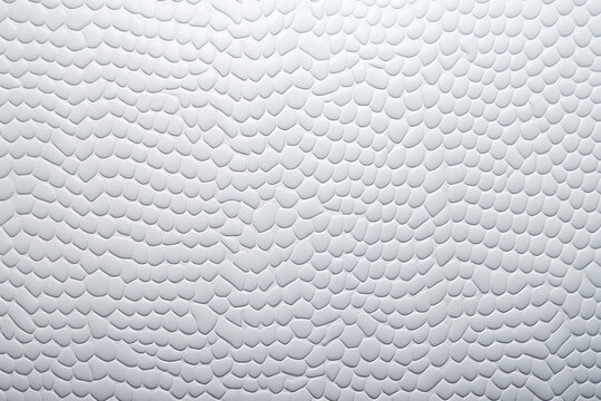 A Close Up Of A White Surface With Wavy Lines