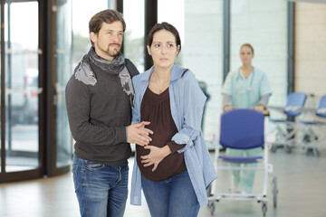 worried couple in the hospital reception