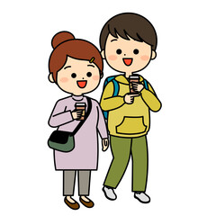 飲み物を持って歩く若い男性と女性