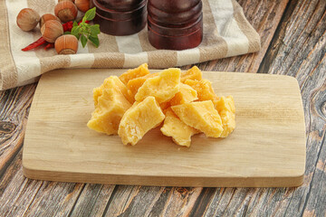 Crushed hard parmesan cheese pieces