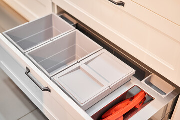 Empty storage box. Open drawer for different utensils and storage. Kitchen utensil cutlery drawer...