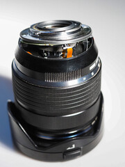 cracked professional lens of a modern digital camera