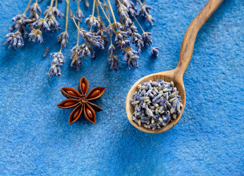Lavender seeds on blue background