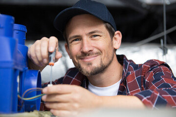 portrait of an electrician at work