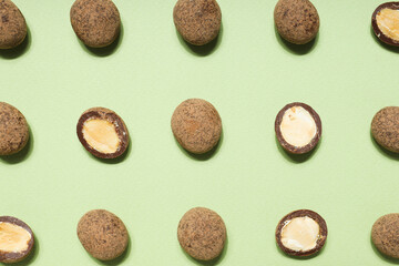 Tasty and sweet food - almonds in chocolate