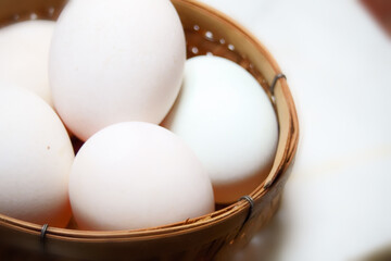Selective focus Duck Eggs in basket. For healthy concept, medical concept. Nutrition and diet idea concept. Health benefits of eggs.
