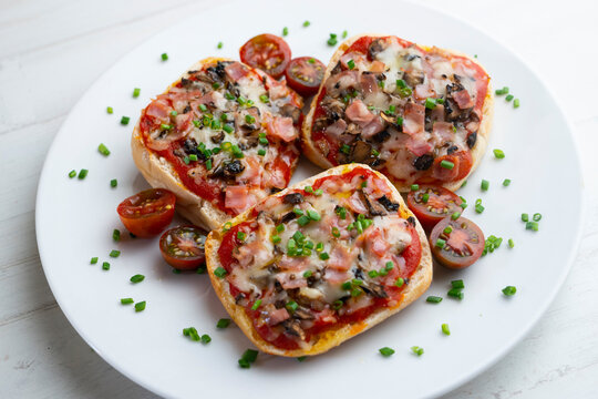 Italian pannini with ham and cheese cooked in the oven.