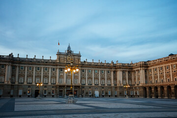 Royal Palace of Madrid and Plaza Armeria square during dusk