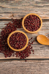 Red kidney beans in a basket wooden isolated on wood background