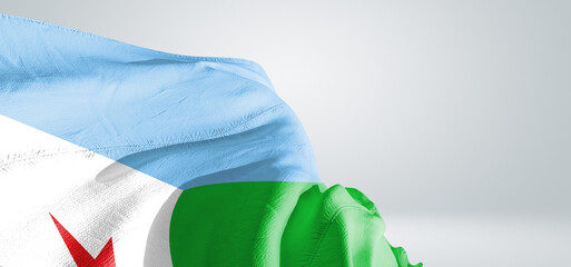 Djibouti national flag cloth fabric waving on beautiful sky Background.