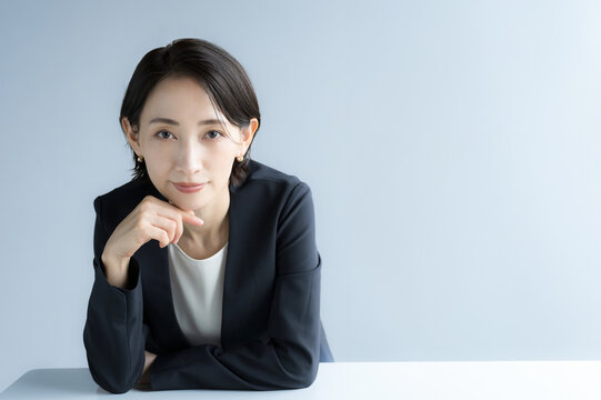 Businesswoman looking at the camera with cheekbones Business image for introductions and recommendations Labor relations and human resources
