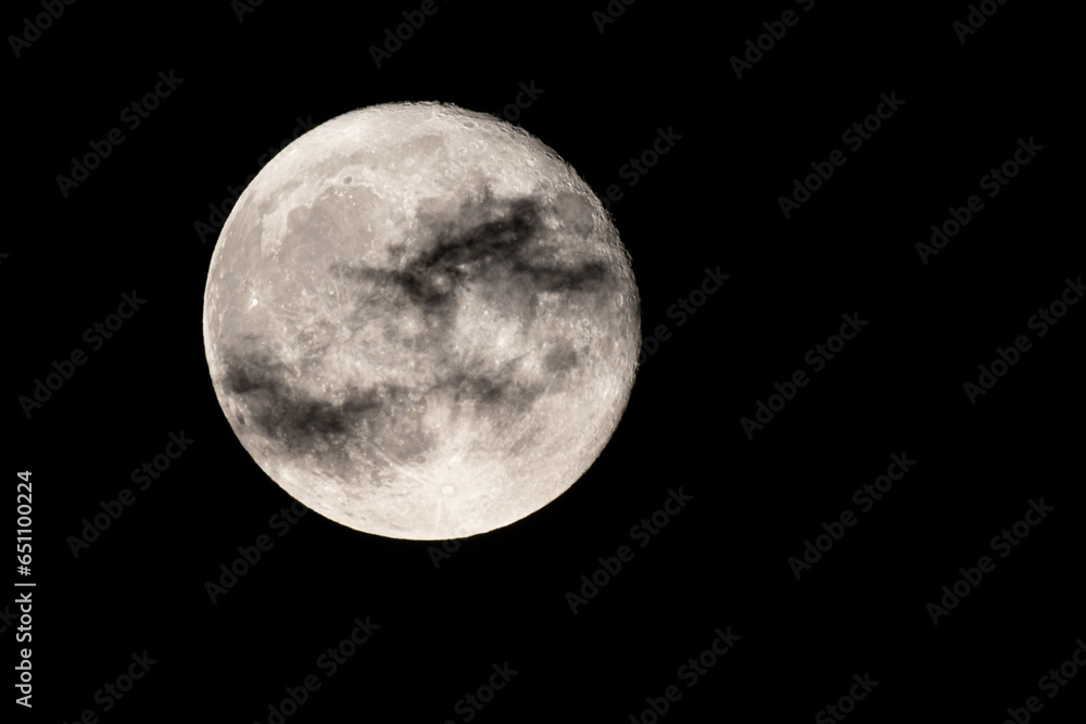 Wall mural full moon photographed with a telescope and reflex camera where you can see the craters on the lunar