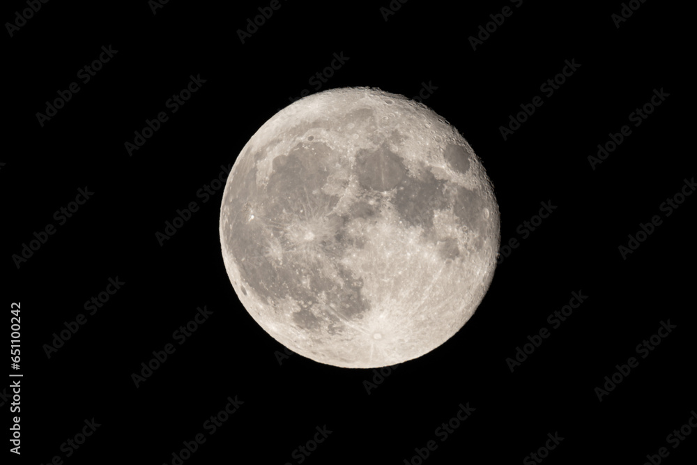 Wall mural full moon photographed with a telescope and reflex camera where the craters on the lunar surface can