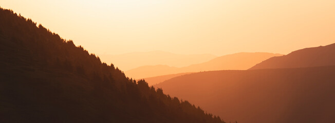Sunset mountains header - 651108439