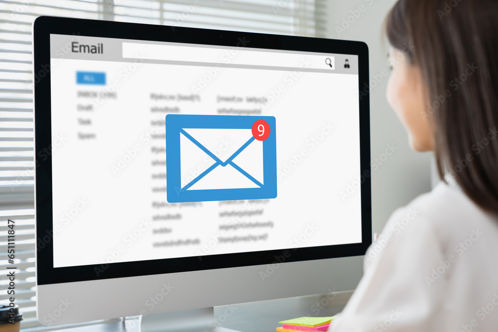 Aufkleber businesswoman sitting using computer with checking email inbox on website.