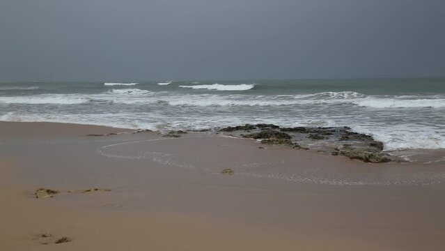 Morocco nature. Sidi Bouzid beach waves, near El Jadida. Rainy day on Atlantic coast in Morocco.