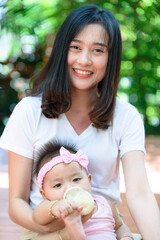 Baby drink milk from bottle