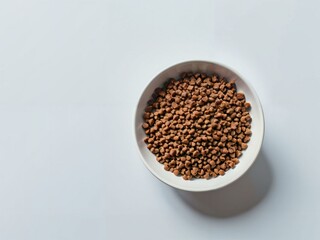 Pet food in a white bowl on a white background copy space for text, Top-view 