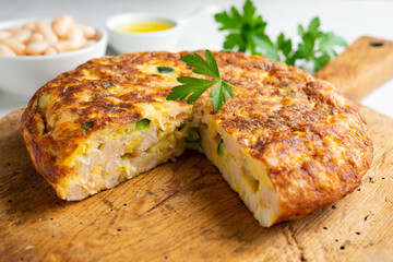 Spanish potato omelette made with white beans and zucchini.