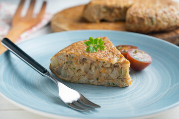 Spanish omelet made with rice and carrot.