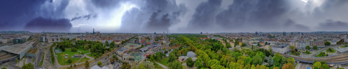 Vienna, Austria. Panoramic aerial view of Prater area and city skyline during a storm