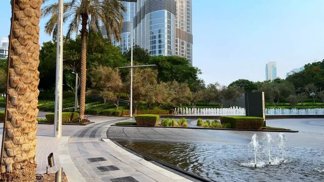 Dubai city, cityscape during daytime, skyscrapers with blue sky daytime, Burj Khalifa close up. High quality FullHD footage