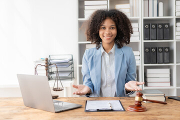 Court proceedings, African female judge smiling neutrally looking at camera wise justice...