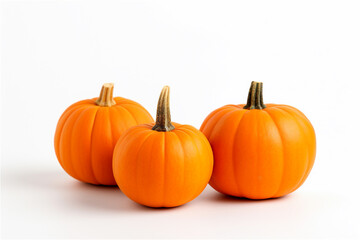 orange pumpkins in a row isolated on a white background