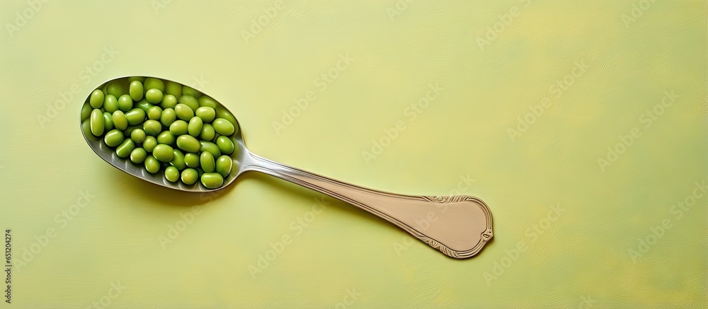 Poster fork background and green peas isolated pastel background copy space