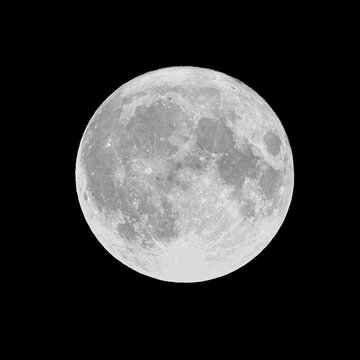 Detailed close-up of the captivating lunar surface, revealing the moon's intriguing craters and rugged beauty in stunning clarity.