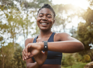 African runner woman, smart watch and park for check, smile or happy for time, results or fitness...