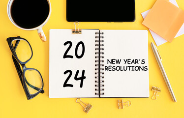 2024 new year goal, plan, action. Concepts with text on notepad and office accessories. Business management, Inspiration to success ideas