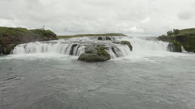 Steadicam aerial video of the Burra River with the Brouarfoss waterfall, Iceland